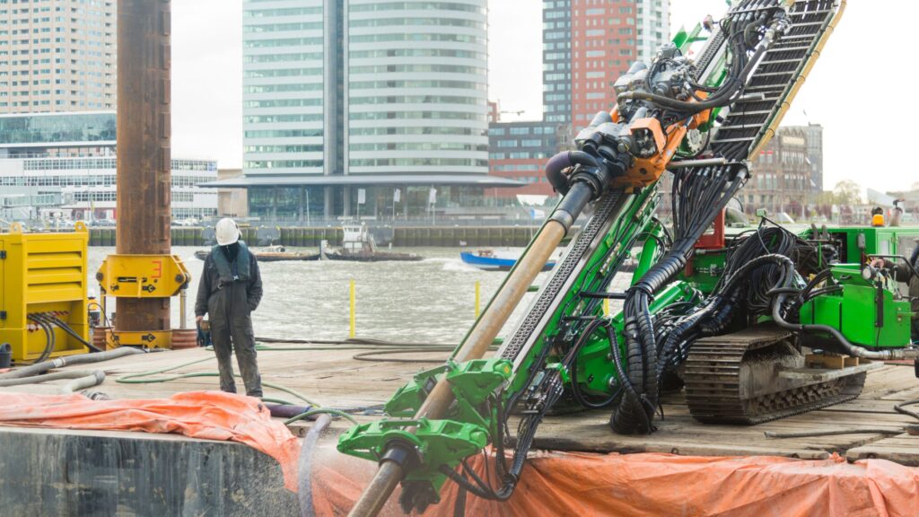 Trenchless construction expert witness observing directional drilling operation