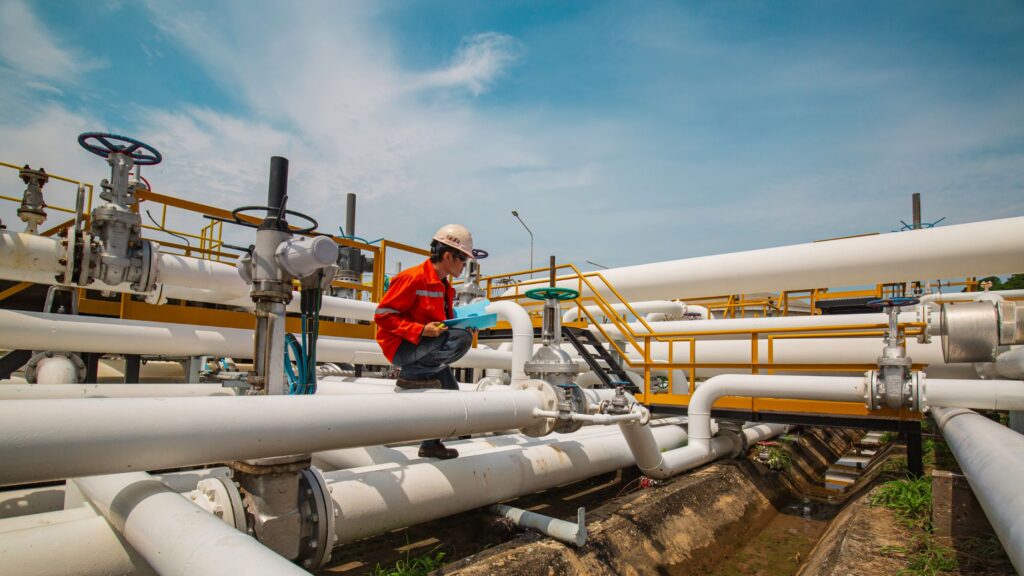 Expert analyzing trenchless construction equipment and site documentation