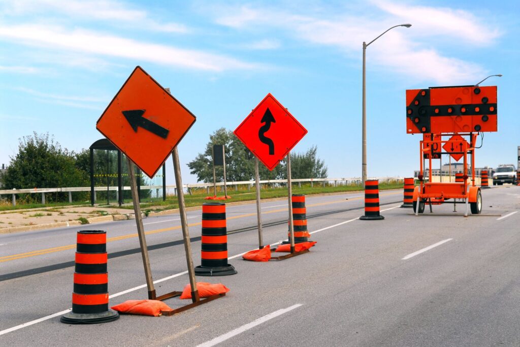 Diagram of construction work zone traffic control plan with signage and lane closures
