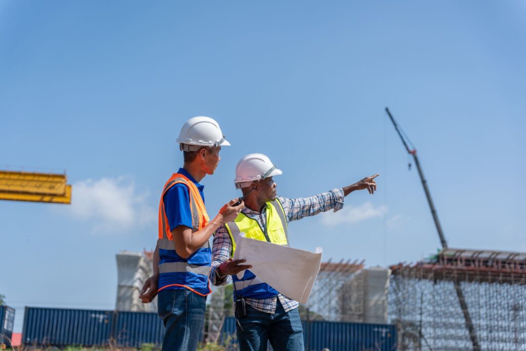 Excavator operating near easement boundary during construction project analyzed by Discovery Experts.