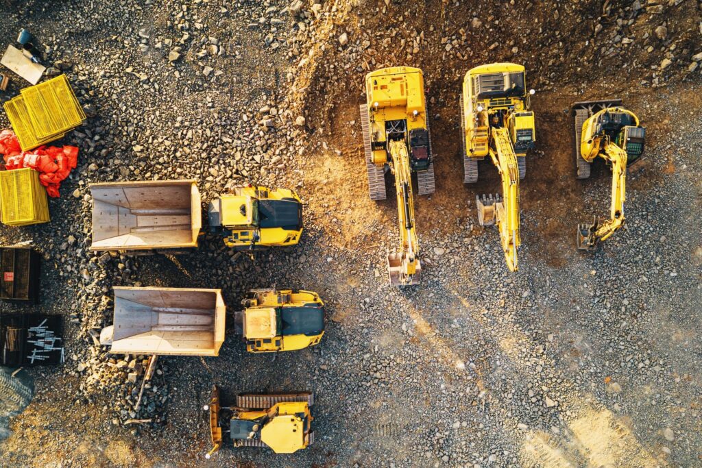 Damaged heavy construction machinery under inspection for dispute resolution