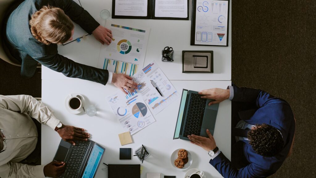 Construction expert reviewing project schedule to evaluate delay claims and responsibility