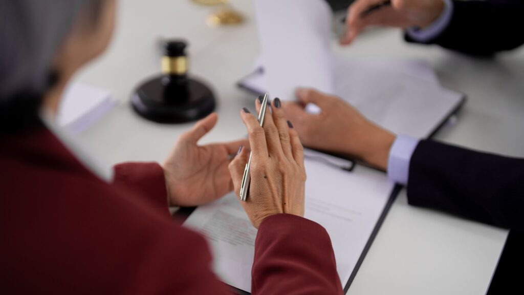 Construction expert witness reviewing project documents for litigation support