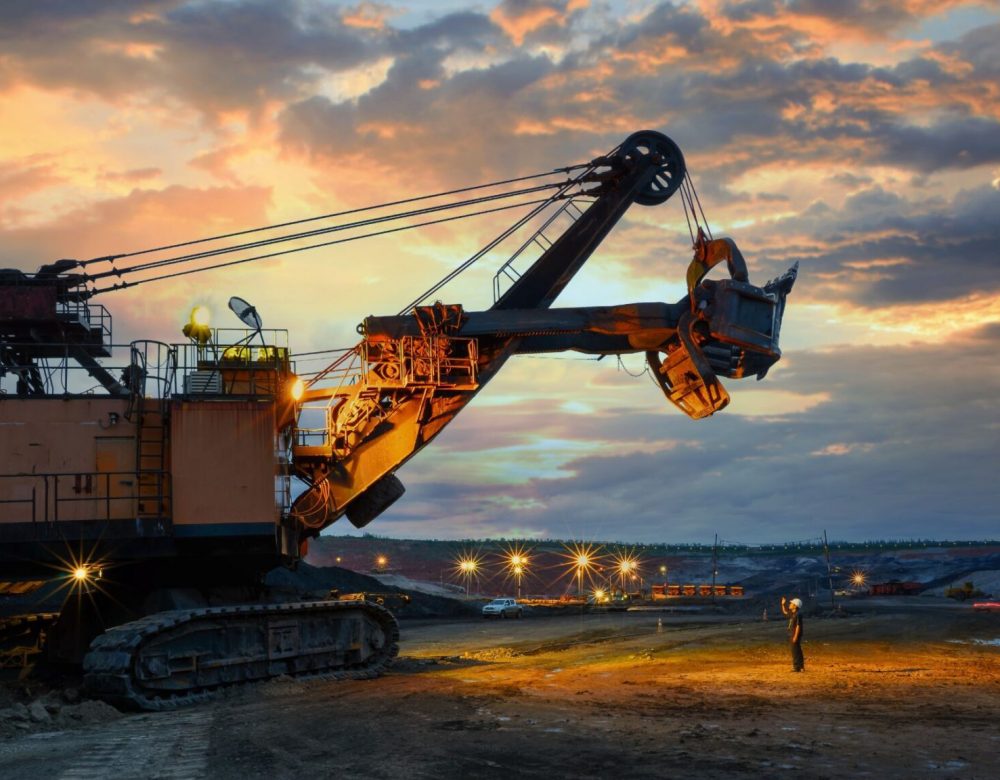 Aerial view of civil and underground construction site with heavy equipment during inspection