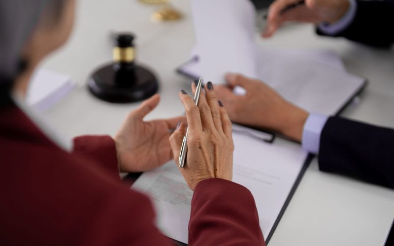 Construction expert witness reviewing project documents for litigation support