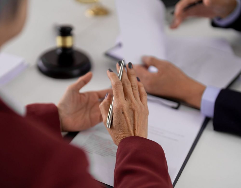 Construction expert witness reviewing project documents for litigation support