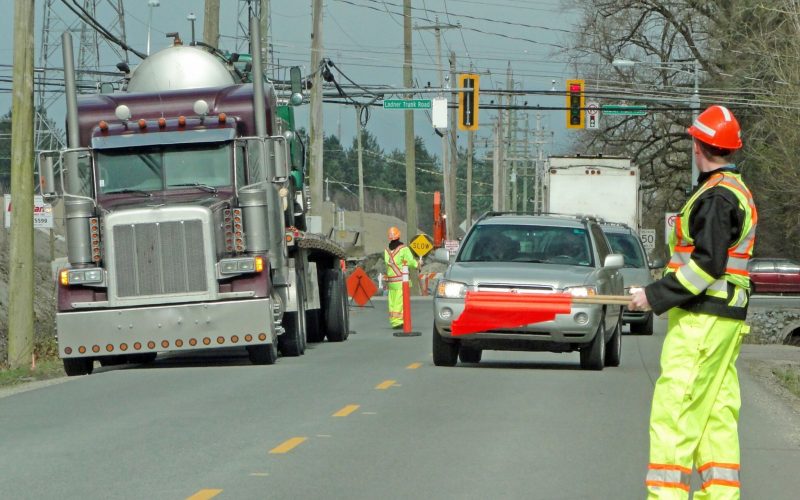 safety-traffic-control-civil-construction-expert-witness Safety traffic control in civil and heavy construction site with barriers and workers