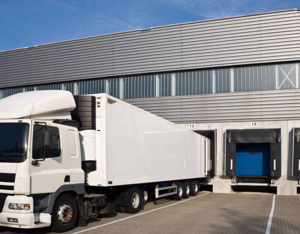 Expert conducting transportation and warehouse site inspection for legal case documentation